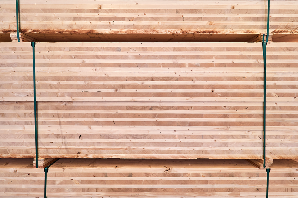 Solid wood components glued together and stacked on top of each other.